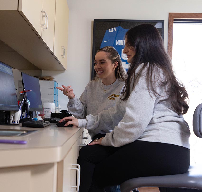 A dental staff member is busy working in the lab inside Profound Orthodontics.